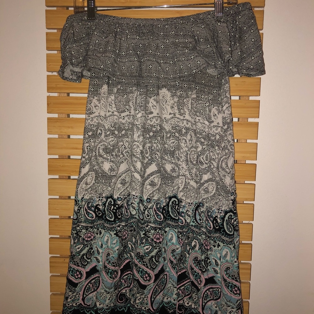 Off the shoulder intricate dress.